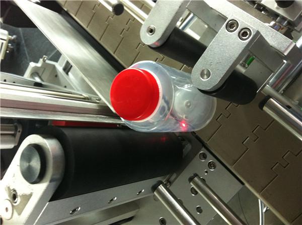 Pawpaw / Guava ümmarguse pudeli kleebise märgistamise masin joogiväljale